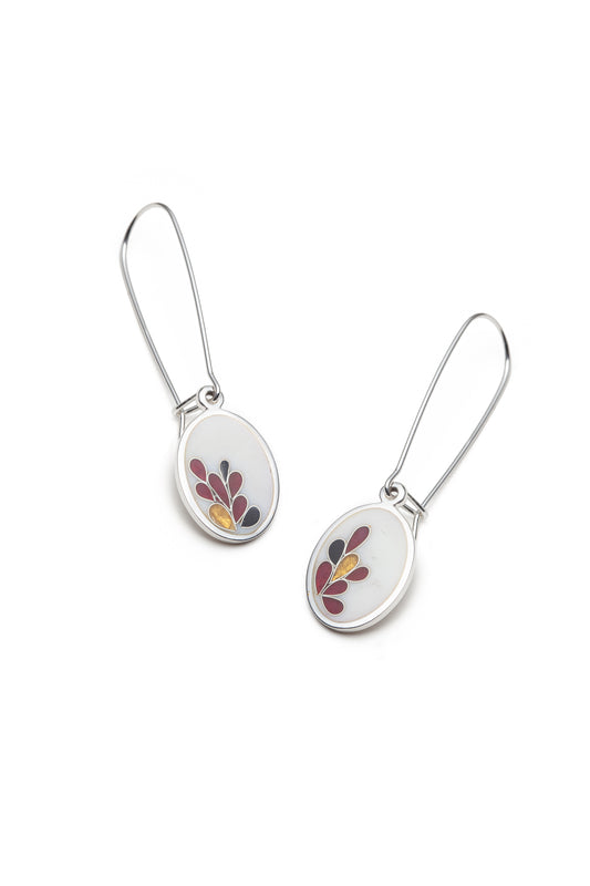 White and red oval earrings